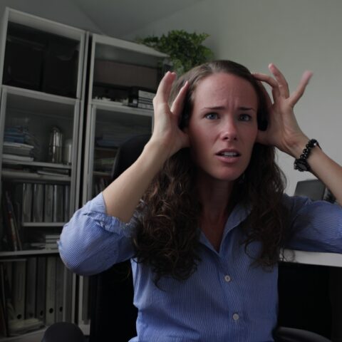 neurodivergence in women - female overstimulated at desk at work