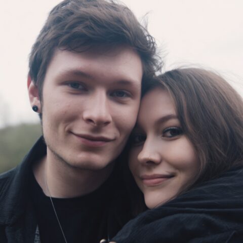 neurodivergent relationship - couple hugging outside