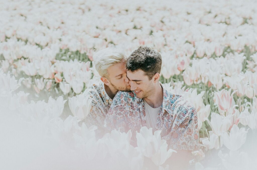 gay couple in a field
