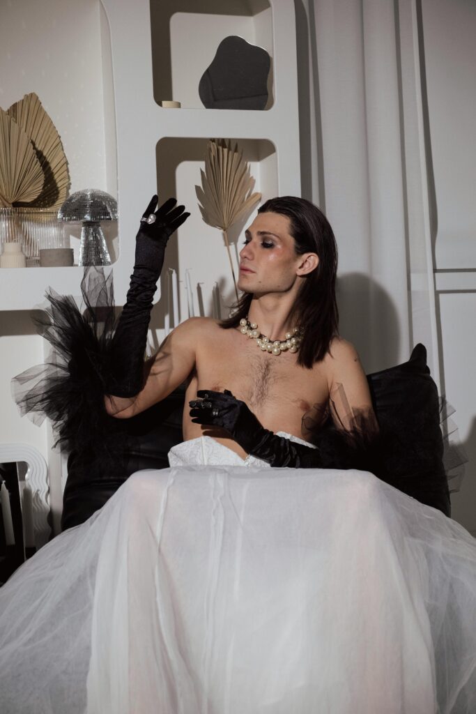 guy sitting in bed wondering Why Am I Only Attracted to Androgynous People